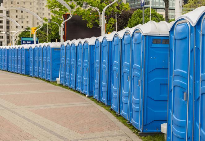 a row of portable restrooms at an outdoor special event, ready for use in Duarte, CA